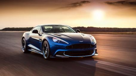 Sleek Blue Sports Car at Sunset wallpaper