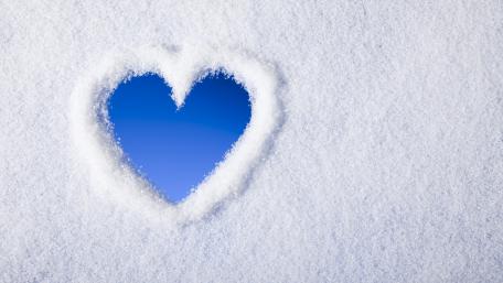Warmth of Love in Winter Snowy Scene wallpaper