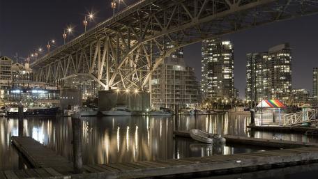 City Nights Illuminated by Urban Reflections wallpaper