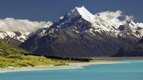 Majestic Mountains Reflected in Crystal Clear Waters wallpaper