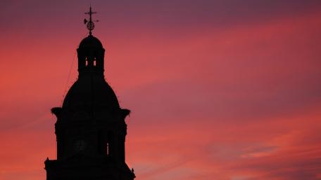 City Silhouette Against a Vibrant Sunset Sky wallpaper