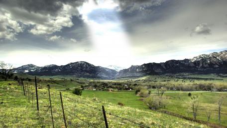 Majestic Mountain Landscape Under Dramatic Sky wallpaper