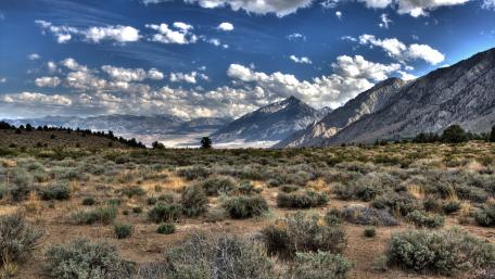 Majestic Mountain Landscape Under a Vibrant Sky wallpaper