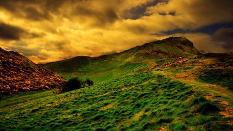 Majestic Hills Under Dramatic Skies wallpaper