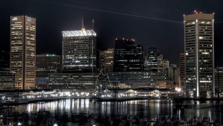 City Lights Reflecting on Water at Night wallpaper