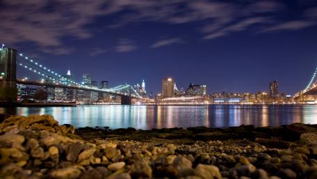 City Lights Reflected in Water at Night wallpaper