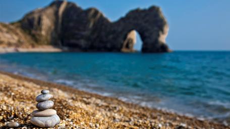 Serenity at Durdle Door Beach Balancing Stones wallpaper
