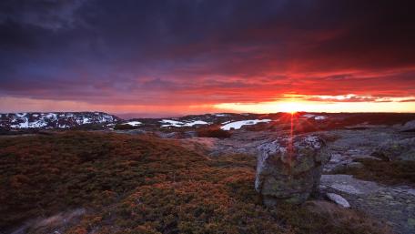 Vibrant Sunset Over Snowy Mountainscape wallpaper