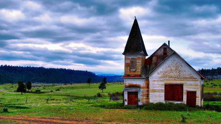 Forgotten Charm of an Abandoned Church in Nature’s Embrace wallpaper