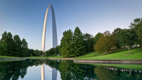 Majestic Arch Reflecting in Tranquil Waters wallpaper