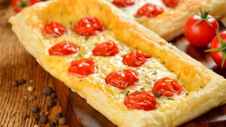 Delicious Puffed Pastry with Cherry Tomatoes and Cheese wallpaper
