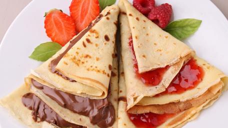 Delicious Crepes with Sweet Fillings and Fresh Fruits wallpaper