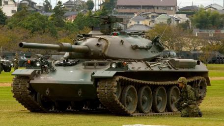 Imposing Military Tank in Action Scene wallpaper
