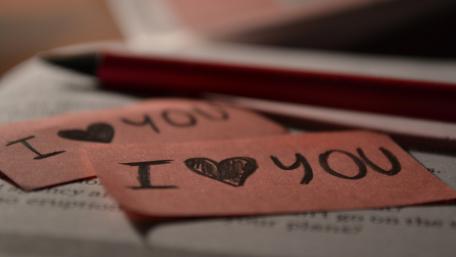 Love Notes on Pages of Romance wallpaper