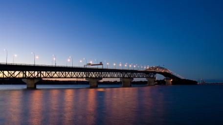 Elegant Twilight Over a City Bridge wallpaper