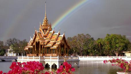Magical Rainbow Over Golden City Temple wallpaper