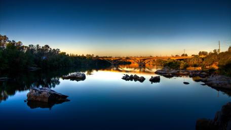 Serene River Landscape at Dusk wallpaper