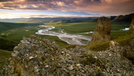 Breathtaking River Valley Under a Colorful Sky wallpaper