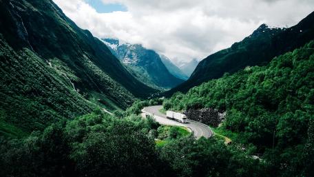 Majestic Mountain Valley Roadscape wallpaper