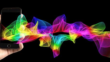 Vibrant Waves of Colorful Energy wallpaper