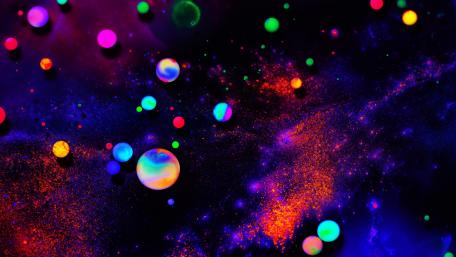 Cosmic Dance of Colorful Orbs wallpaper