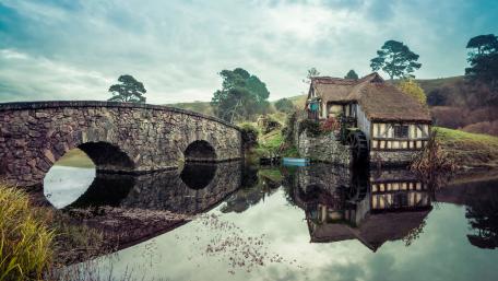 Serene Cottage Reflection by the Watermill wallpaper