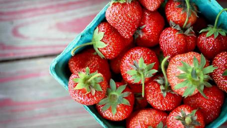 Fresh Strawberries in a Rustic Basket wallpaper