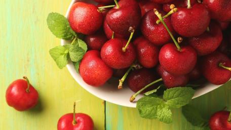 Fresh and Juicy Red Cherries for Summer Treats wallpaper