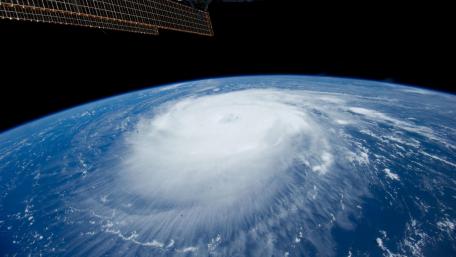 Majestic Whirlwind Above Earth wallpaper