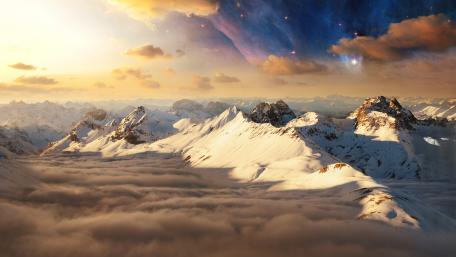 Majestic Mountain Sunrise Above Clouds wallpaper