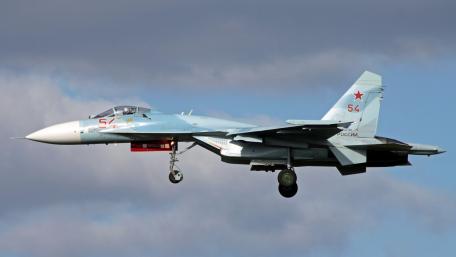 Soviet Fighter Jet in Flight Overcast Sky wallpaper