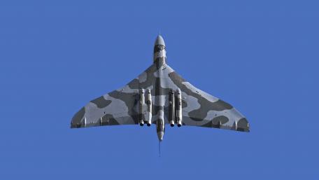 Futuristic Military Aircraft in Flight wallpaper