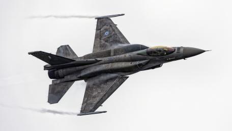 Fighter Jet in Action Overcast Sky wallpaper