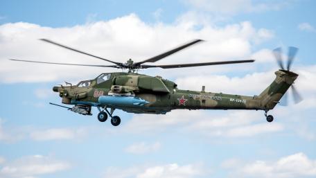 Powerful Military Helicopter in Flight 4K Wallpaper wallpaper