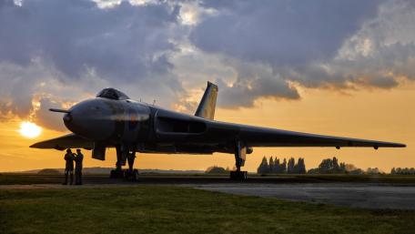 Majestic Bomber at Sunset Scene wallpaper
