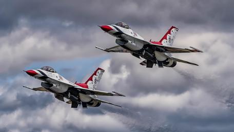 Dynamic Formation of Fighter Jets in Action wallpaper