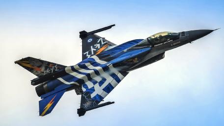 Stunning Military Jet in Flight Frameworks and Colorful Patterns wallpaper