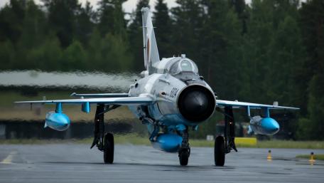 Sleek Fighter Jet Ready for Takeoff wallpaper