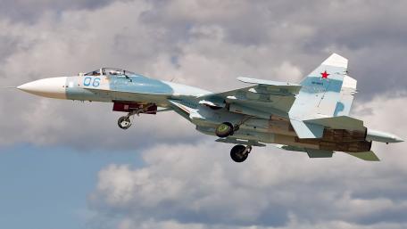 Sleek Su-34 Fighter Jet in Action wallpaper