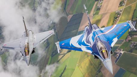 Fighter Jets in Formation Above the Landscape wallpaper