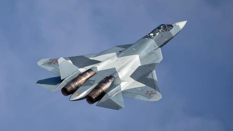 Sleek Fighter Jet Soars Through the Skies wallpaper