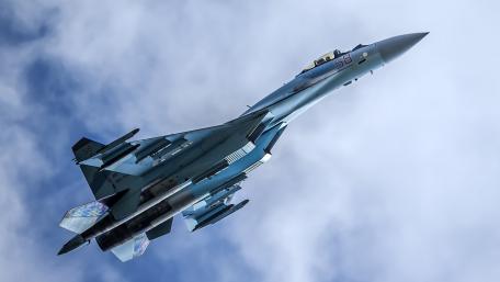 Stunning Aircraft in Flight Above the Clouds wallpaper