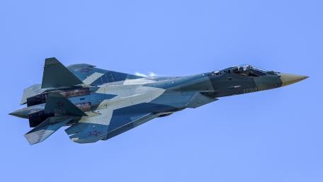 Sleek Su-57 Fighter Jet in Action wallpaper