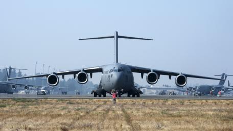 Majestic Military Aircraft on the Tarmac wallpaper