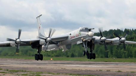 Majestic Military Aircraft in Flight Stunning Wallpaper wallpaper