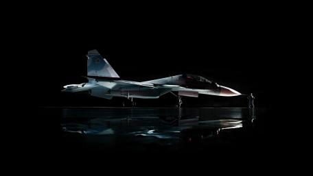 Futuristic Military Jet in Dramatic Lighting wallpaper
