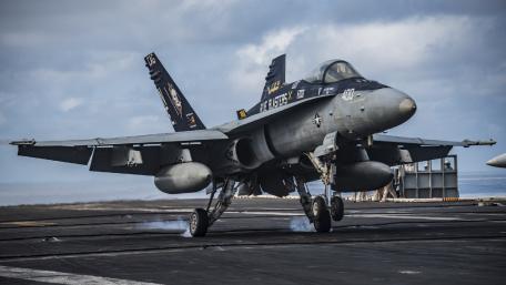 Fighter Jet Launching from Aircraft Carrier wallpaper