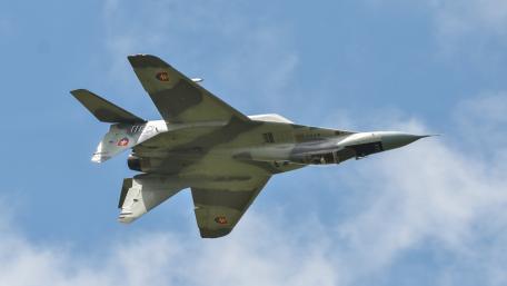 Fighter Jet Soaring Through the Sky wallpaper