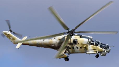 Military Helicopter in Action Amidst the Sky wallpaper