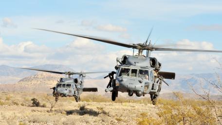 Dynamic Military Helicopters in Action wallpaper